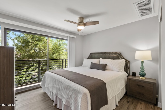 475 N 9th St Unit 206, Phoenix, AZ 85006 - bedroom with wood finished floors and ceiling fan