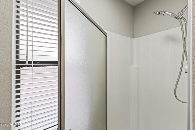 room details with an enclosed shower