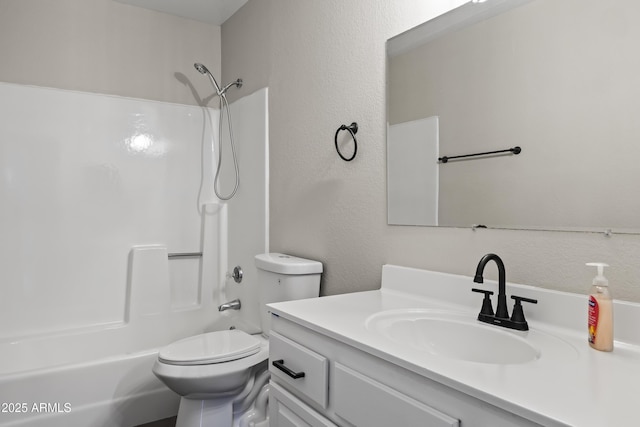 full bathroom with vanity, toilet, and shower / washtub combination