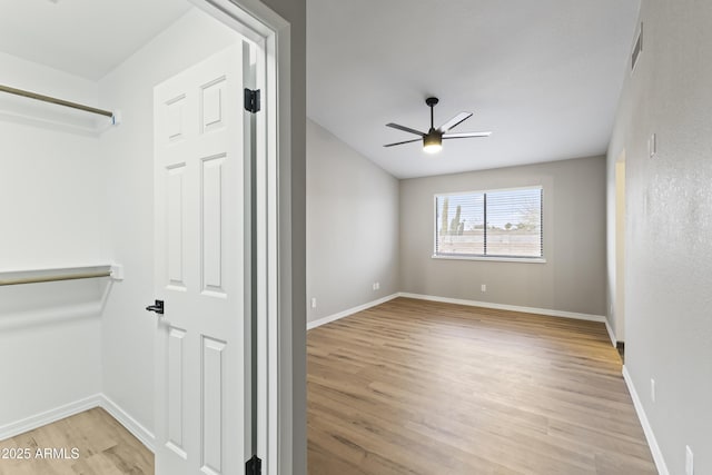 interior space featuring ceiling fan and light hardwood / wood-style floors