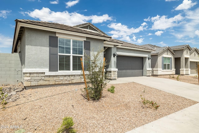 view of front of home featuring a garage