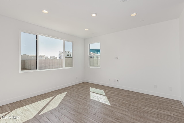 empty room featuring light hardwood / wood-style floors