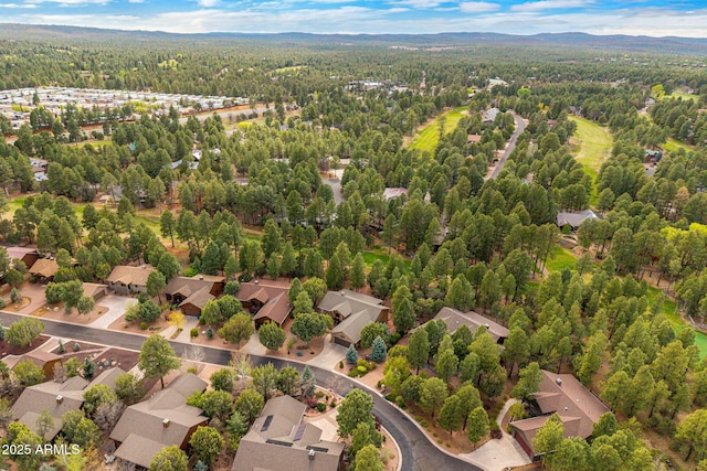 420 N Retreat Dr, Show Low, AZ 85901 - aerial perspective of suburban area featuring a heavily wooded area