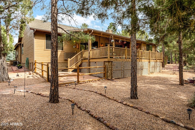 420 N Retreat Dr, Show Low, AZ 85901 - back of property featuring a chimney and a deck