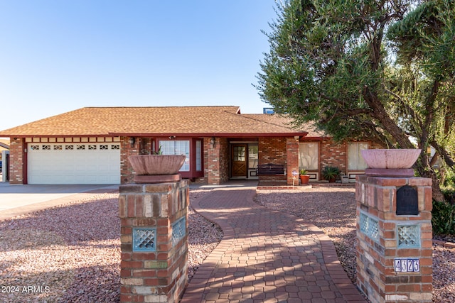 ranch-style house with a garage