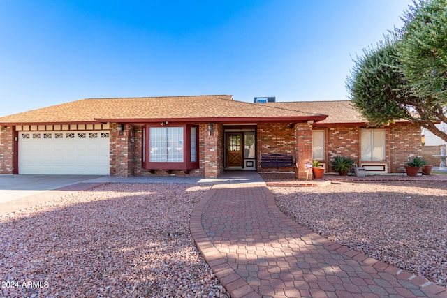 ranch-style house with a garage