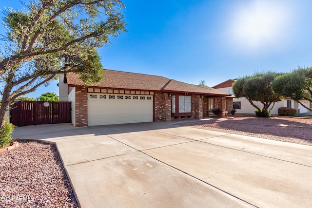 ranch-style home with a garage