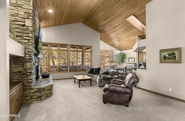living area with carpet flooring, high vaulted ceiling, wooden ceiling, baseboards, and a fireplace