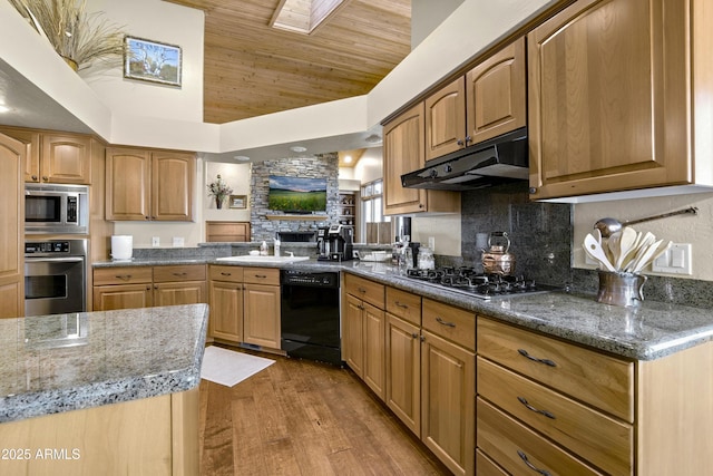 kitchen with stainless steel appliances, under cabinet range hood, wooden ceiling, wood finished floors, and tasteful backsplash