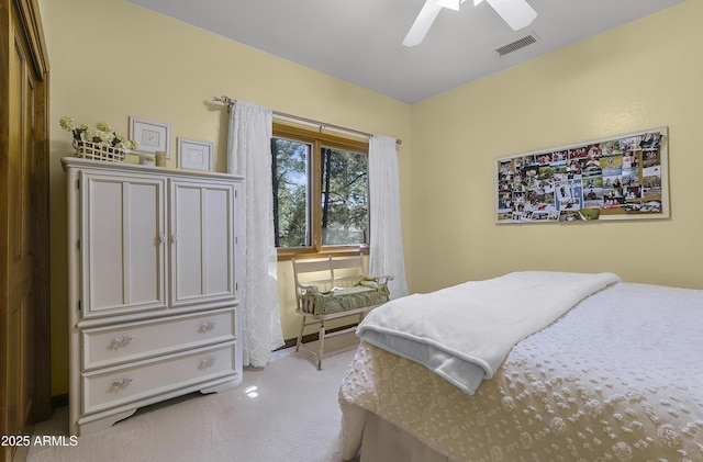carpeted bedroom with a ceiling fan