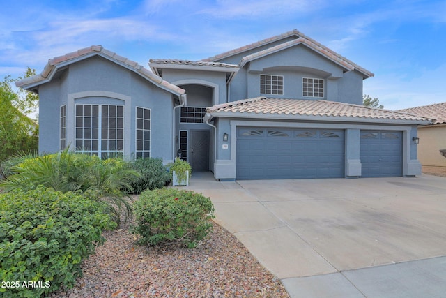 view of front of property with a garage