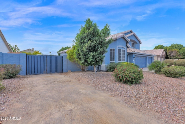 view of side of home with a garage