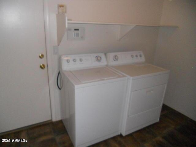 laundry area featuring washing machine and dryer