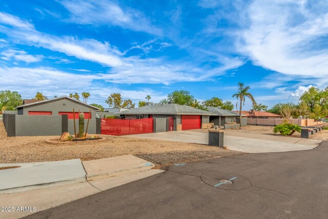18585 N 70th Ave, Glendale, AZ 85308 - ranch-style home with a garage, driveway, and a fenced front yard