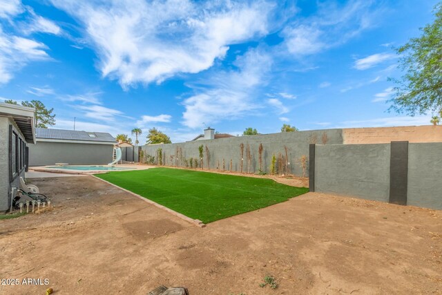18585 N 70th Ave, Glendale, AZ 85308 - view of yard featuring a patio area and a fenced backyard