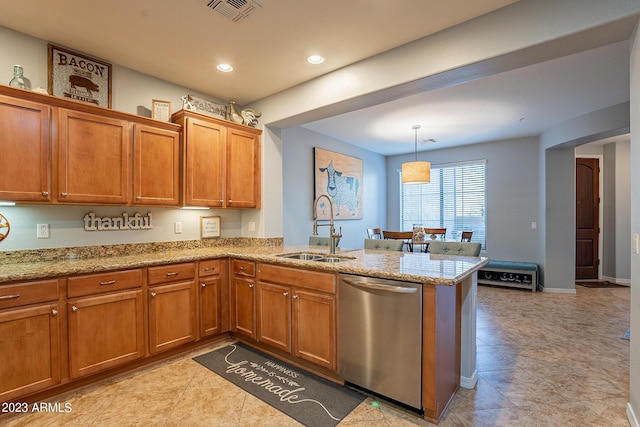 kitchen with pendant lighting, sink, light stone countertops, stainless steel dishwasher, and kitchen peninsula