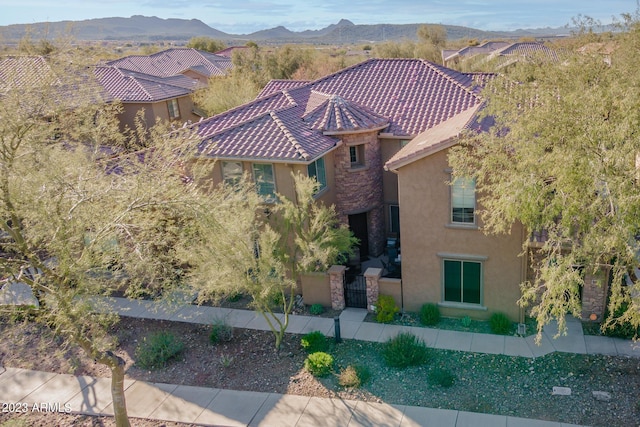 drone / aerial view featuring a mountain view