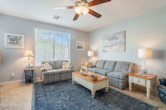 living room featuring tile patterned flooring and ceiling fan