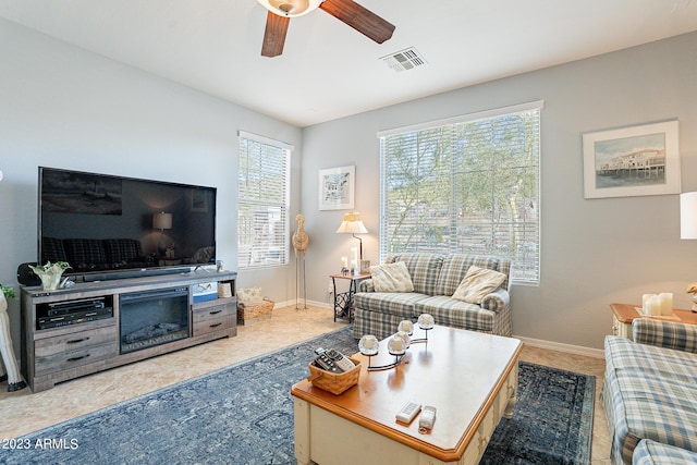 living room featuring ceiling fan