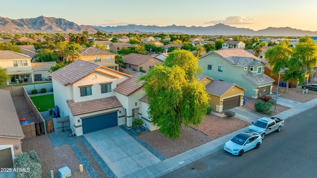 2533 W Novak Way, Phoenix, AZ 85041 - aerial view at dusk of a residential view and a mountain view