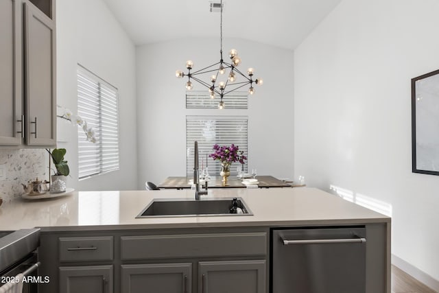 2533 W Novak Way, Phoenix, AZ 85041 - kitchen featuring stainless steel dishwasher, a sink, gray cabinetry, lofted ceiling, and a chandelier
