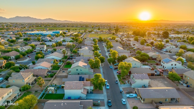 2533 W Novak Way, Phoenix, AZ 85041 - aerial view at dusk of a residential view and a mountain view