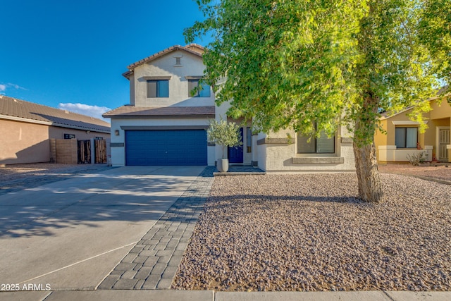 2533 W Novak Way, Phoenix, AZ 85041 - view of front of home with stucco siding, driveway, a garage, a tiled roof, and fence