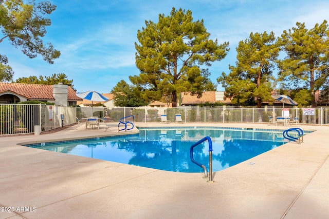 view of pool featuring a patio area