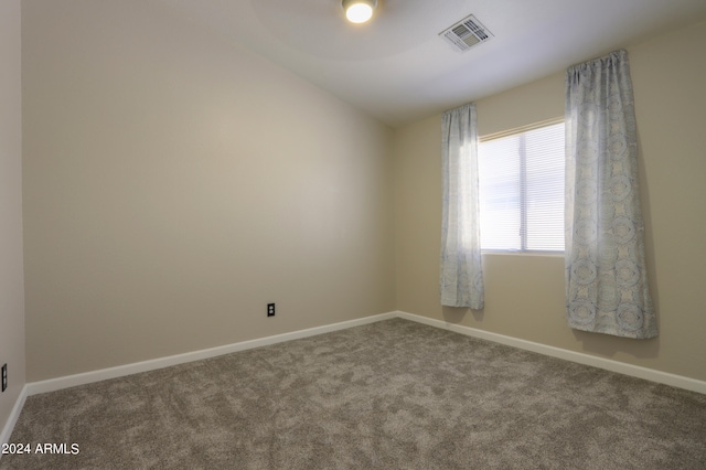 empty room with carpet flooring