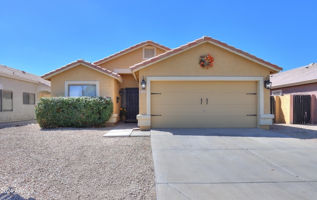 view of front of home with a garage