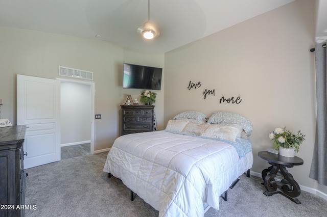 carpeted bedroom with ceiling fan