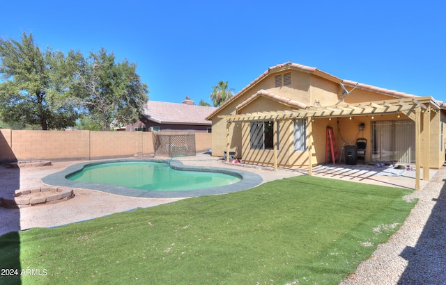 view of pool featuring a pergola, a yard, and a patio area