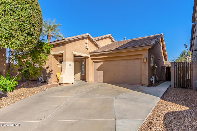 view of front of property with a garage