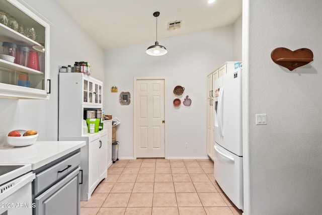 7031 S 32nd Pl, Phoenix, AZ 85042 - kitchen featuring white appliances, light tile patterned floors, gray cabinetry, decorative light fixtures, and light countertops
