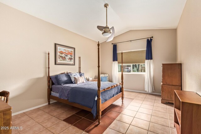 7031 S 32nd Pl, Phoenix, AZ 85042 - bedroom with vaulted ceiling, light tile patterned flooring, baseboards, and a ceiling fan