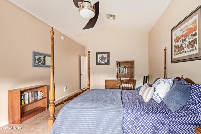 7031 S 32nd Pl, Phoenix, AZ 85042 - bedroom featuring lofted ceiling, light tile patterned floors, a ceiling fan, and baseboards
