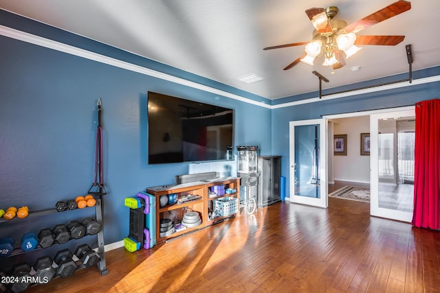 2728 W Adventure Dr, Anthem, AZ 85086 - living area with french doors, a ceiling fan, and wood finished floors