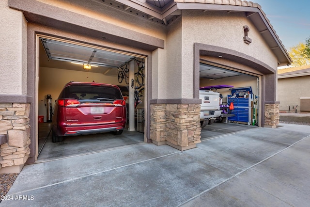 2728 W Adventure Dr, Anthem, AZ 85086 - garage with concrete driveway and a garage door opener