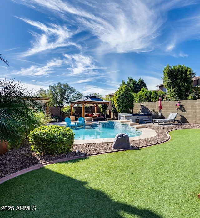 2728 W Adventure Dr, Anthem, AZ 85086 - view of pool with a gazebo, a hot tub, a fenced backyard, a patio, and an outdoor hangout area