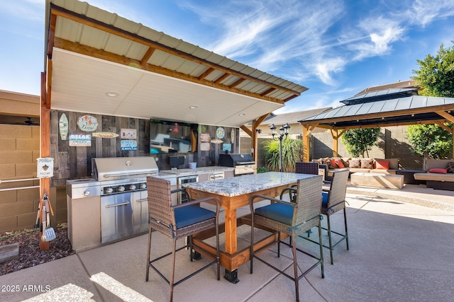 2728 W Adventure Dr, Anthem, AZ 85086 - view of patio / terrace featuring outdoor lounge area, a gazebo, an outdoor kitchen, and outdoor dining space