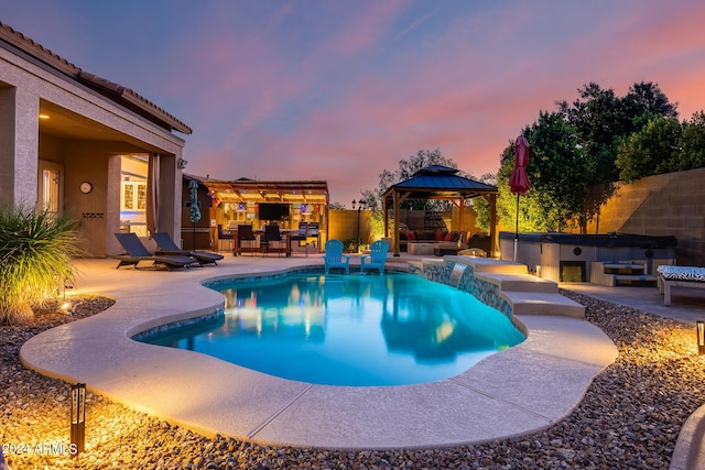 2728 W Adventure Dr, Anthem, AZ 85086 - view of pool with a gazebo, a hot tub, a patio area, a fenced backyard, and outdoor lounge area