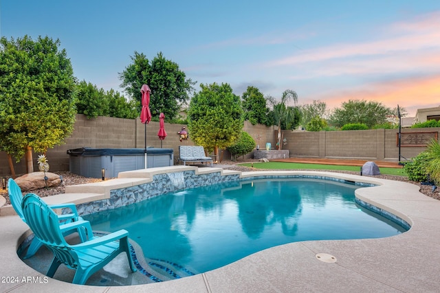 2728 W Adventure Dr, Anthem, AZ 85086 - pool at dusk featuring a fenced backyard