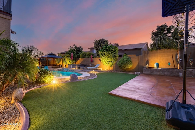2728 W Adventure Dr, Anthem, AZ 85086 - fenced backyard with a gazebo and a patio area