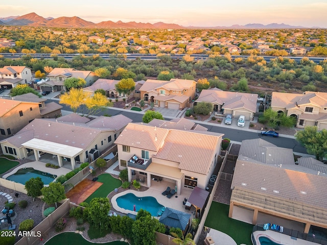 2728 W Adventure Dr, Anthem, AZ 85086 - aerial view at dusk of view of pool area, a residential view, and a mountain view