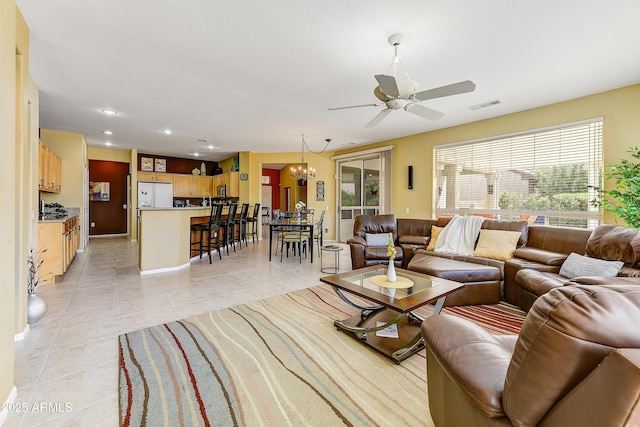 20454 N Palm Canyon Dr, Surprise, AZ 85374 - living room with recessed lighting, visible vents, ceiling fan with notable chandelier, and light tile patterned flooring