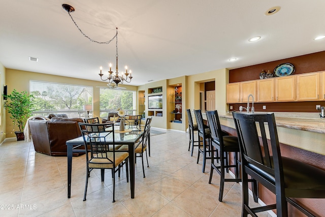 20454 N Palm Canyon Dr, Surprise, AZ 85374 - dining space featuring visible vents, recessed lighting, a chandelier, light tile patterned flooring, and baseboards