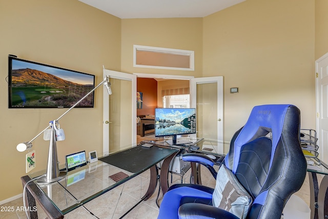 20454 N Palm Canyon Dr, Surprise, AZ 85374 - home office featuring baseboards, high vaulted ceiling, and tile patterned flooring