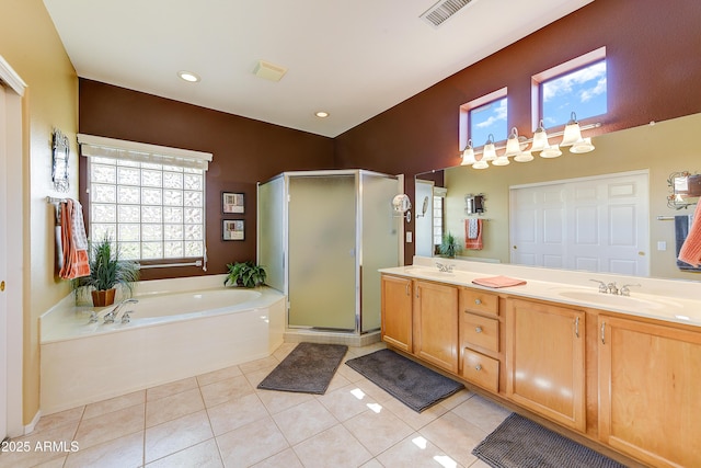 20454 N Palm Canyon Dr, Surprise, AZ 85374 - full bath featuring tile patterned flooring, visible vents, a sink, and a garden tub