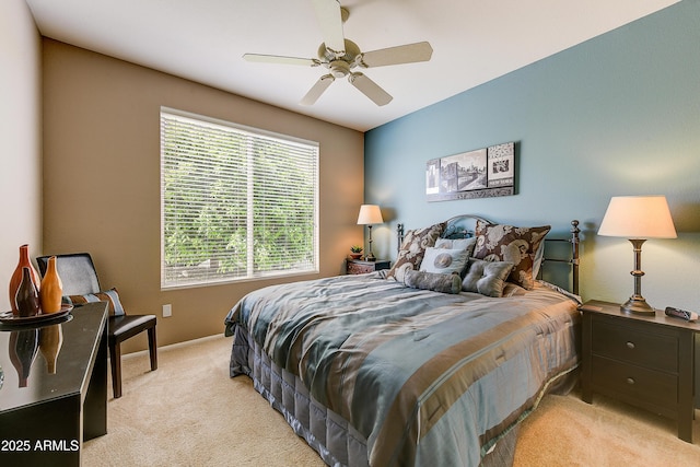 20454 N Palm Canyon Dr, Surprise, AZ 85374 - bedroom with light colored carpet, baseboards, and a ceiling fan