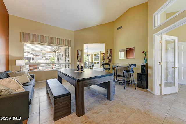 20454 N Palm Canyon Dr, Surprise, AZ 85374 - dining room featuring visible vents, baseboards, high vaulted ceiling, and light tile patterned flooring